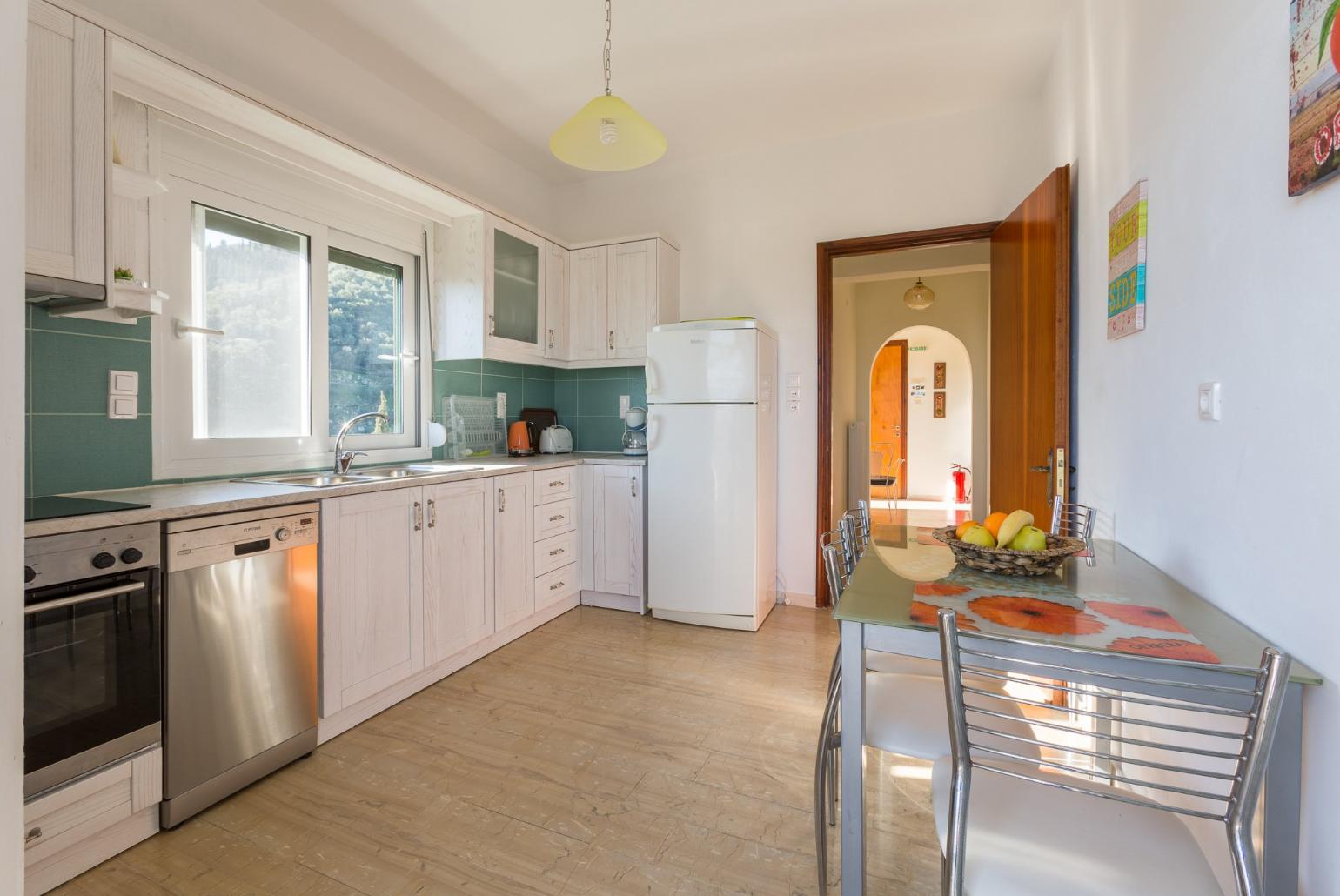  Equipped kitchen and dining area.