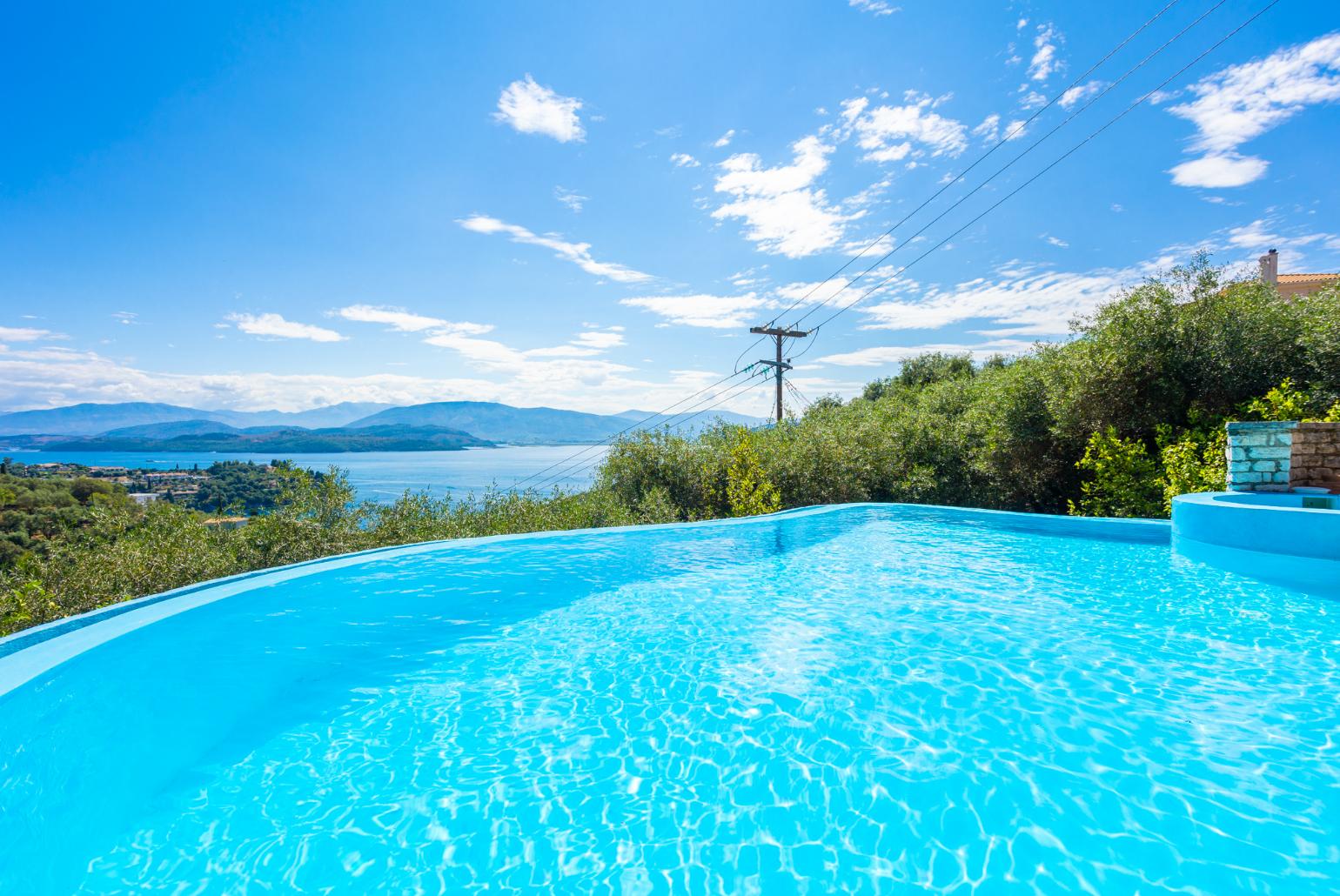 Private infinity pool and terrace with panoramic sea views