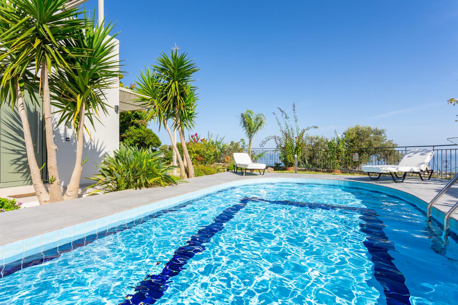 Private pool, terrace, and garden with sea views