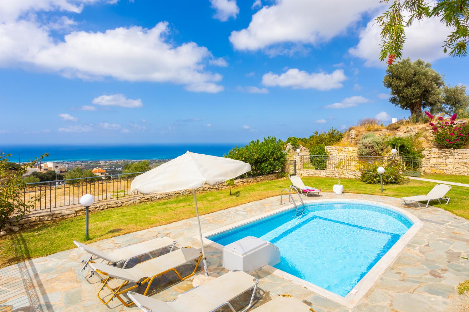 Private pool, terrace, and garden with sea views