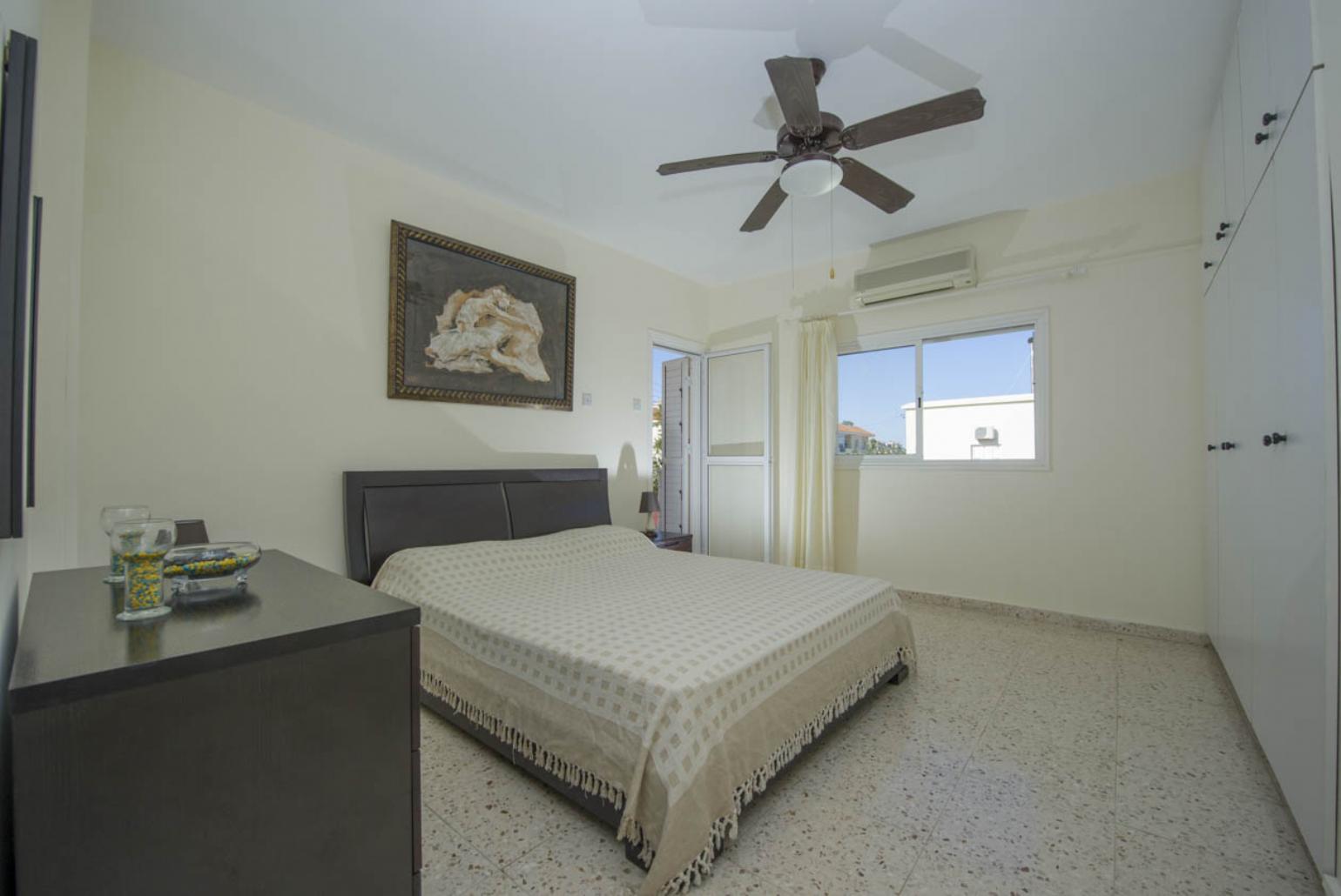 Double bedroom with A/C and balcony access