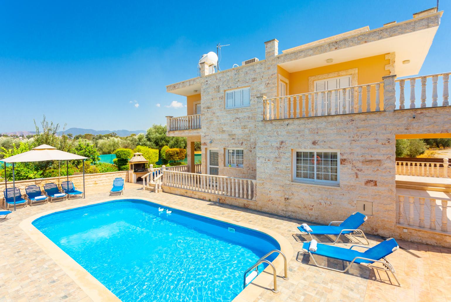 ,Beautiful villa with private pool, terrace, and large garden