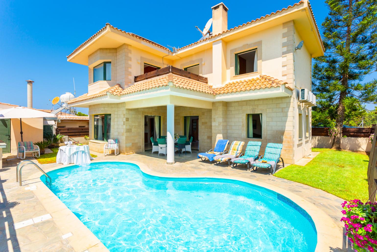 ,Beautiful villa with private pool, terrace, and large garden