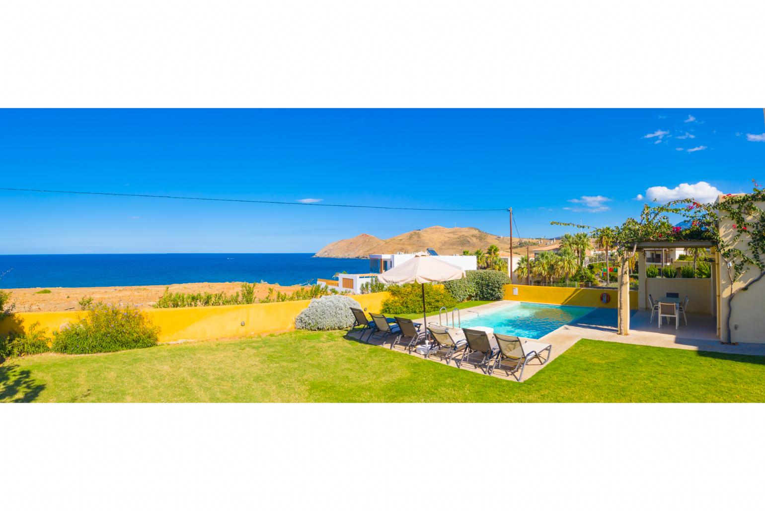 Private pool, terrace, and garden with panoramic sea views