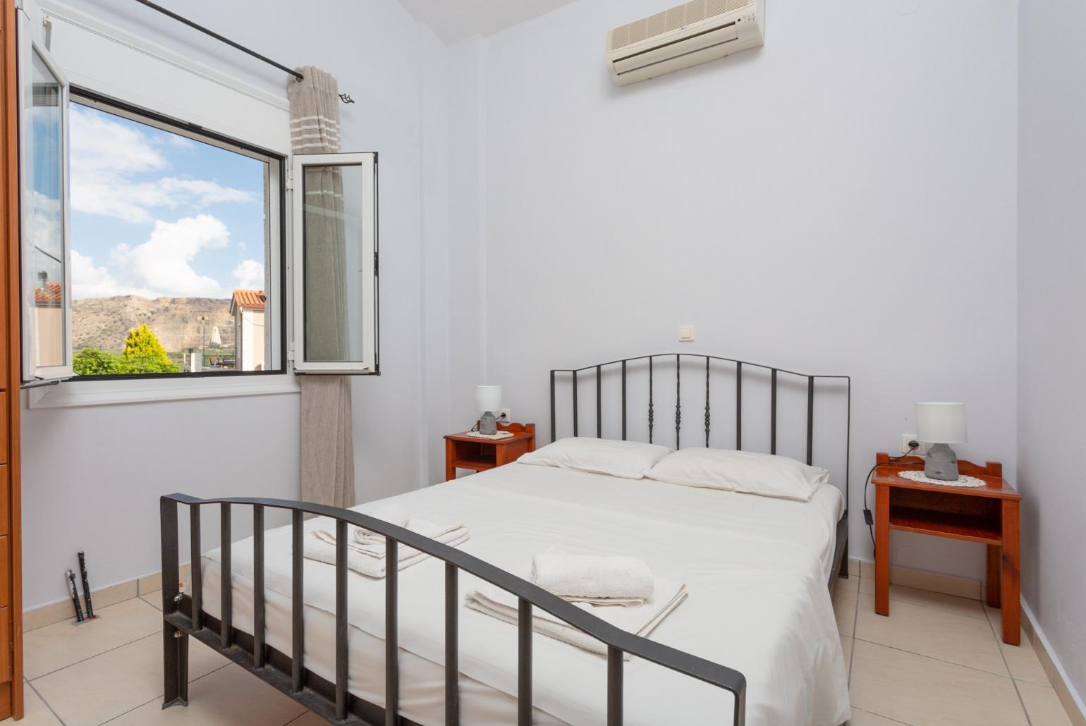 Double bedroom with A/C and balcony access