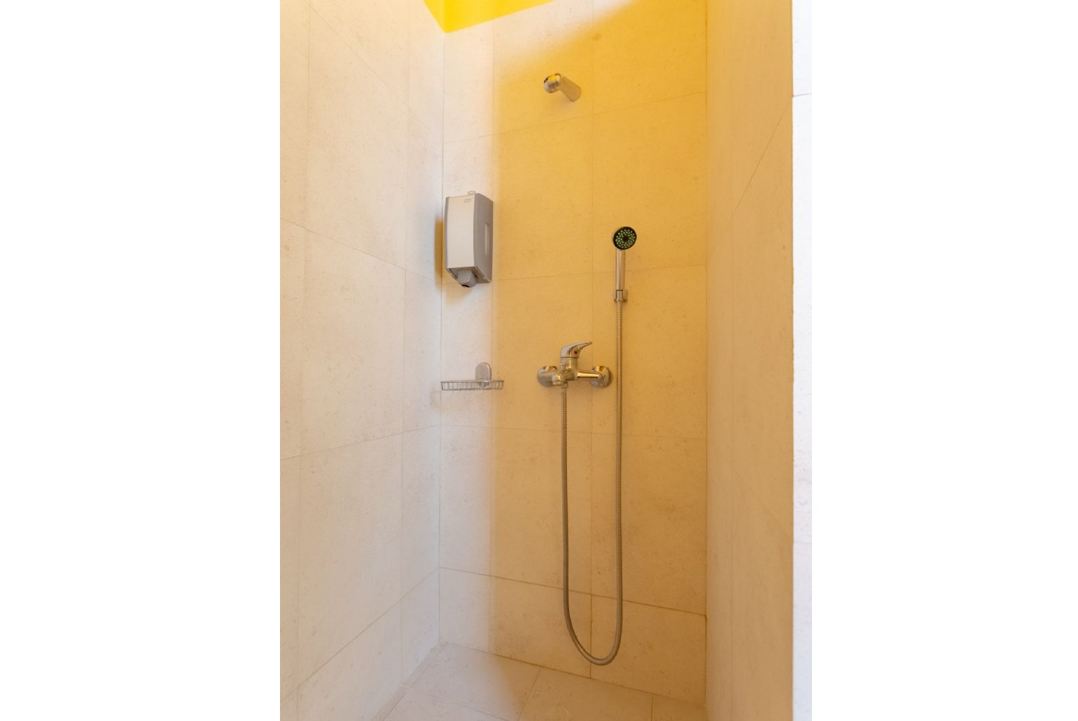 En suite bathroom with overhead shower