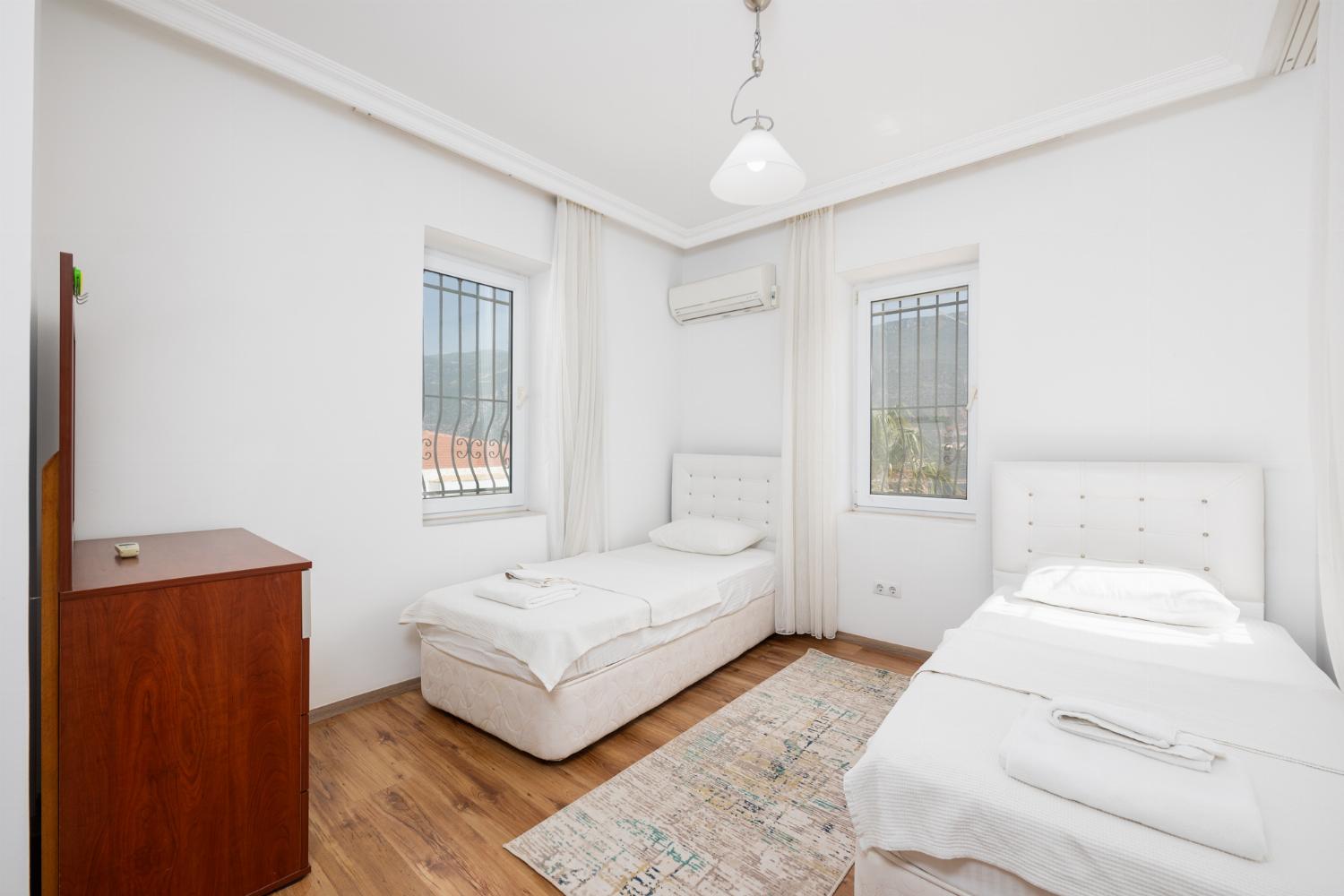 Twin bedroom with A/C
