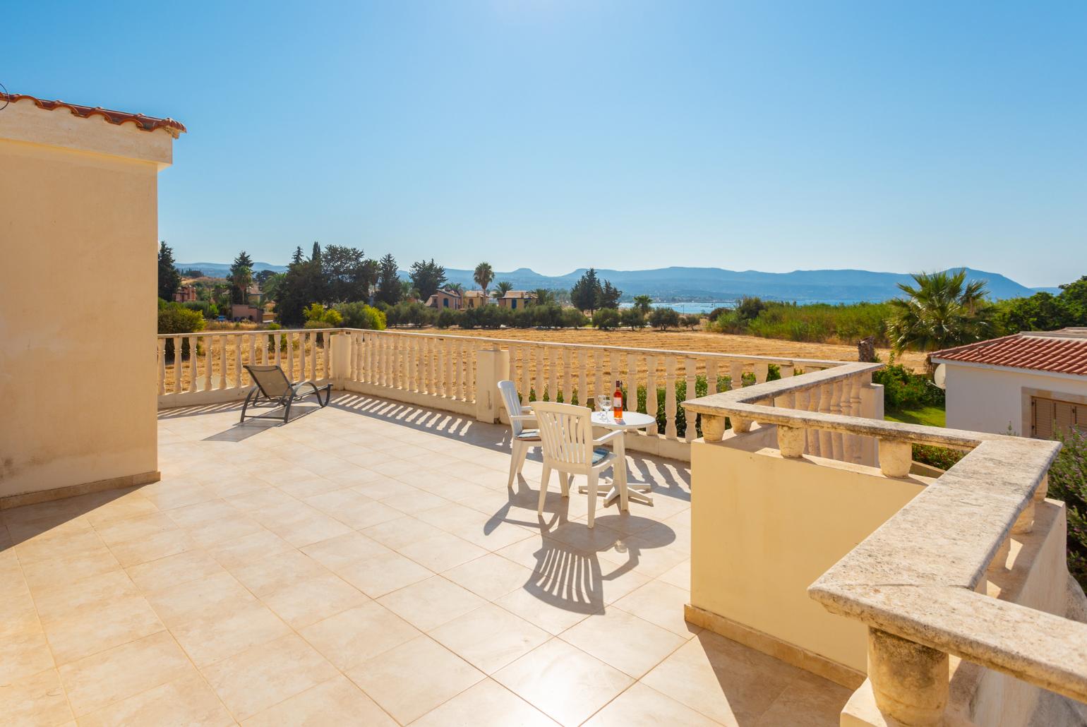 Upper terrace area with sea views