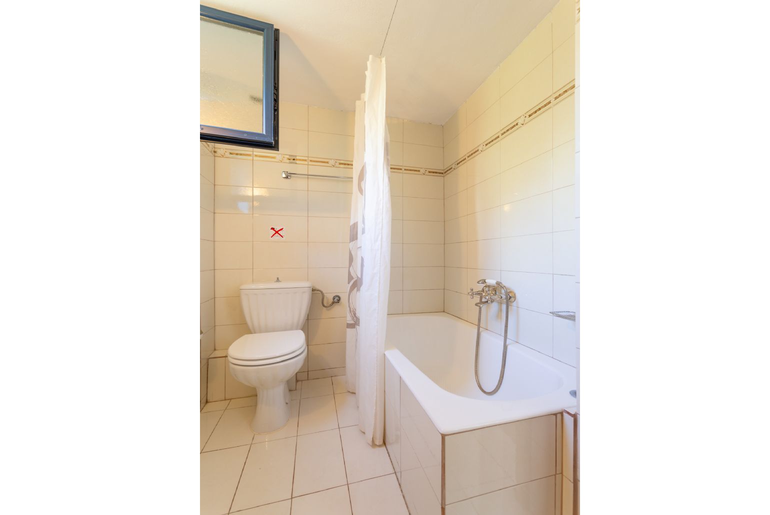 Family bathroom with bath and shower