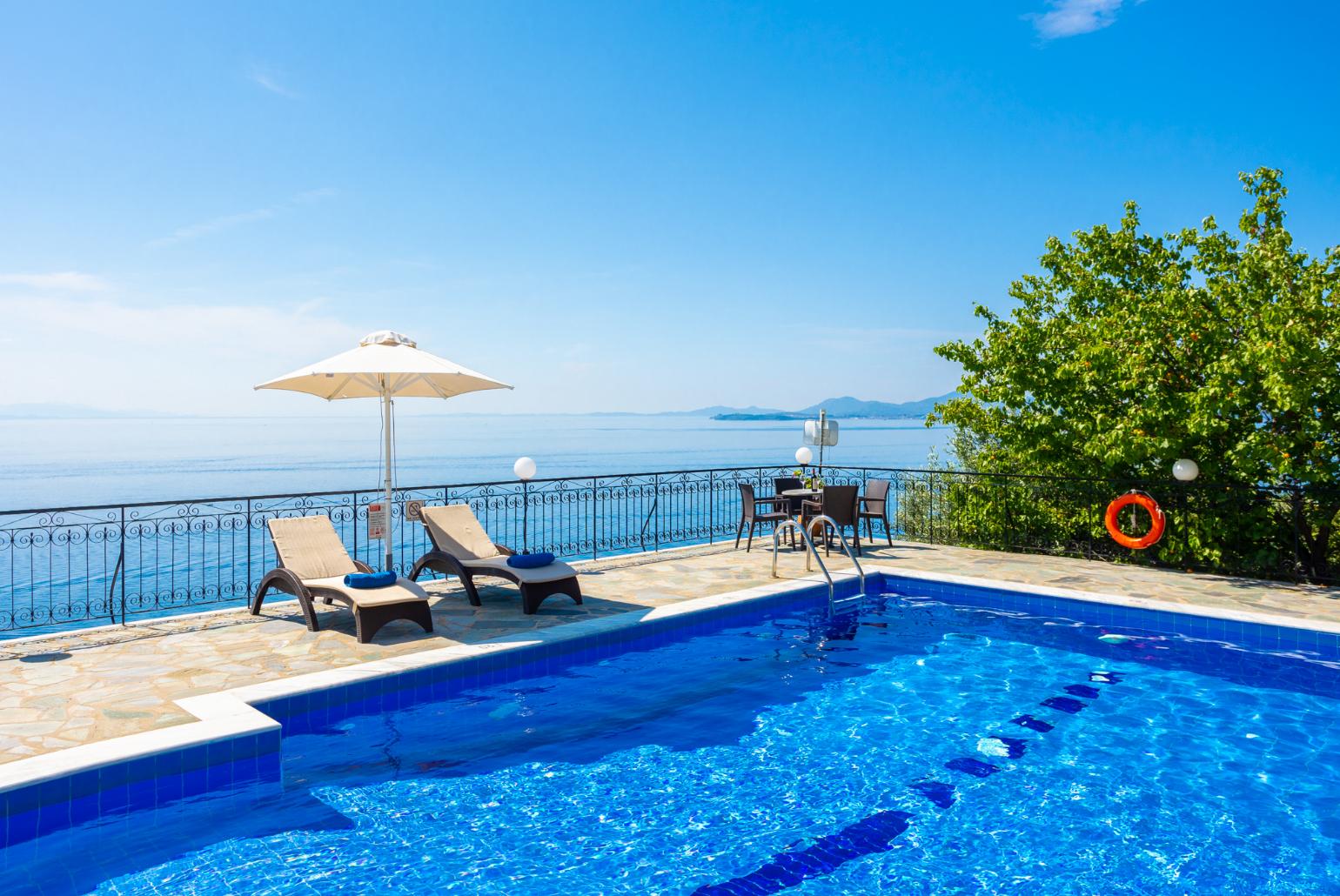 Private pool and terrace with panoramic sea views