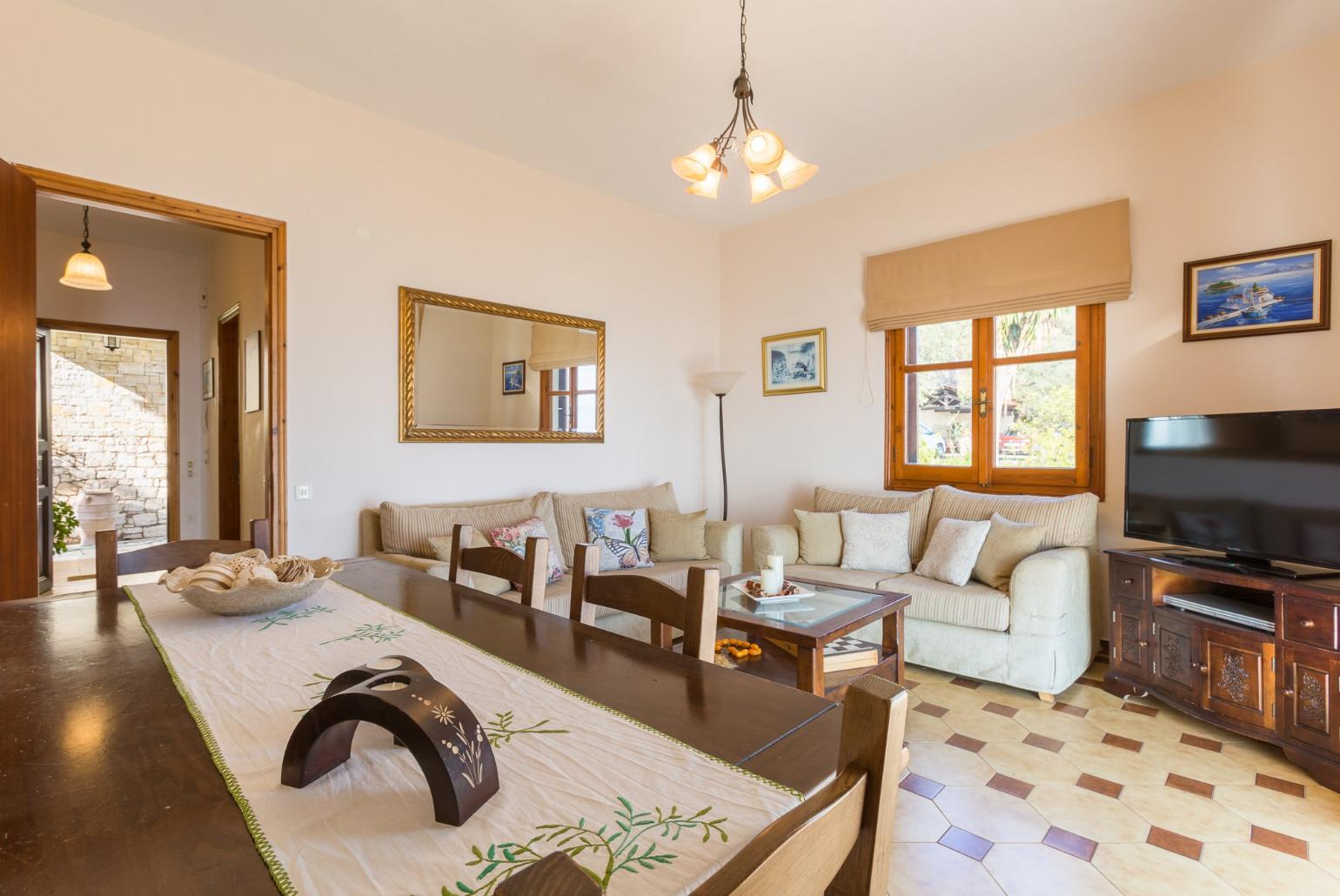 Living room with indoor dining and TV 