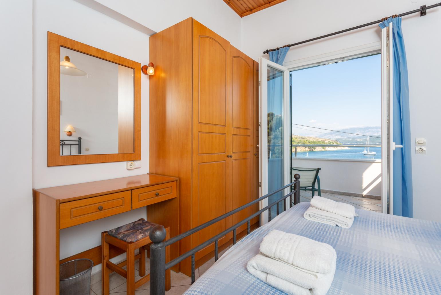 Double bedroom with A/C, and terrace access with sea views