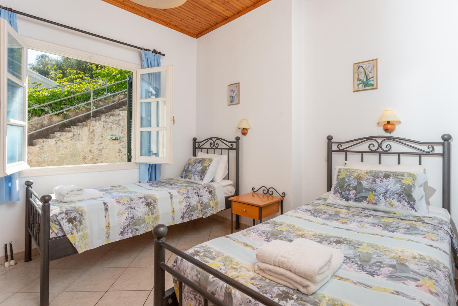 Twin bedroom with A/C, and terrace access with sea views