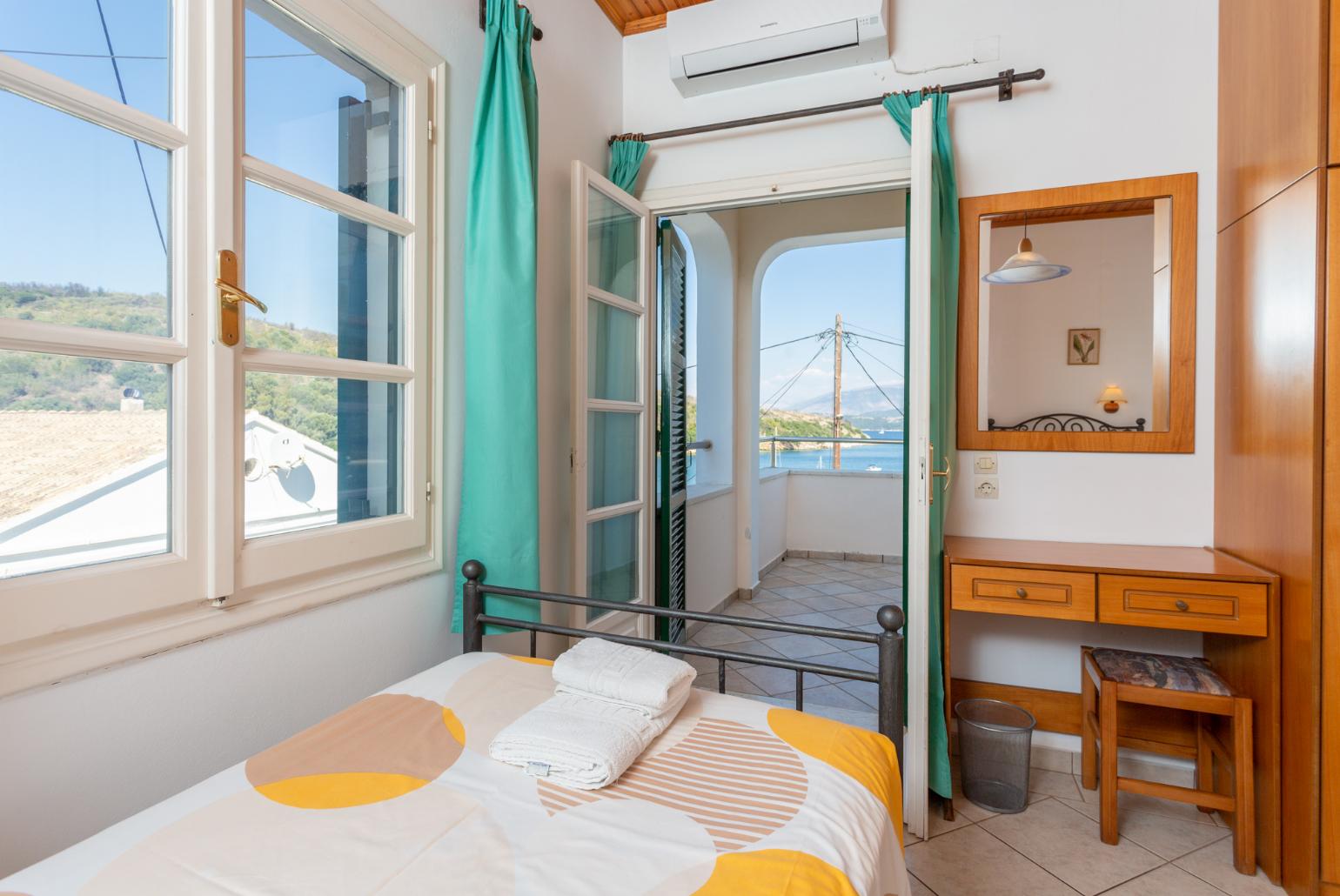 Twin bedroom with A/C, and terrace access with sea views