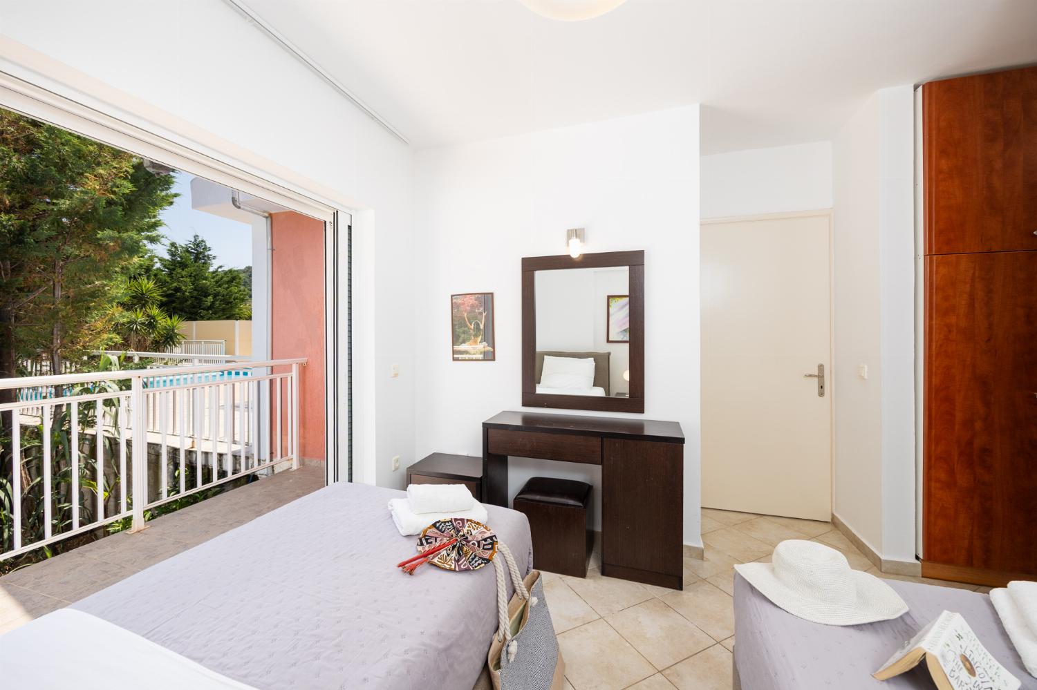 Twin bedroom with en suite bathroom and A/C