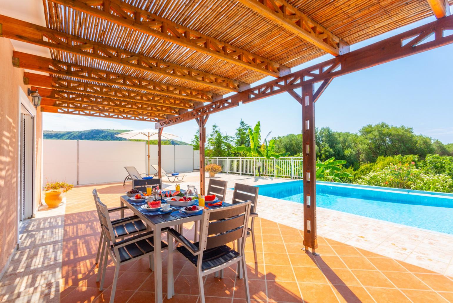 Partially sheltered terrace area for outdoor dining