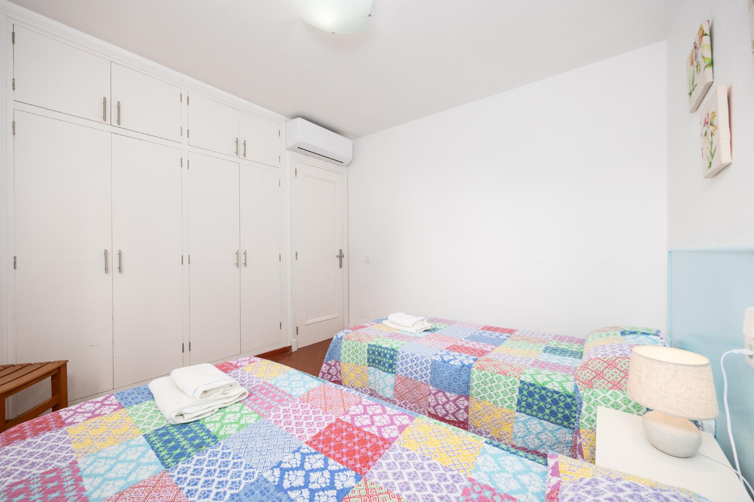 Twin bedroom with A/C