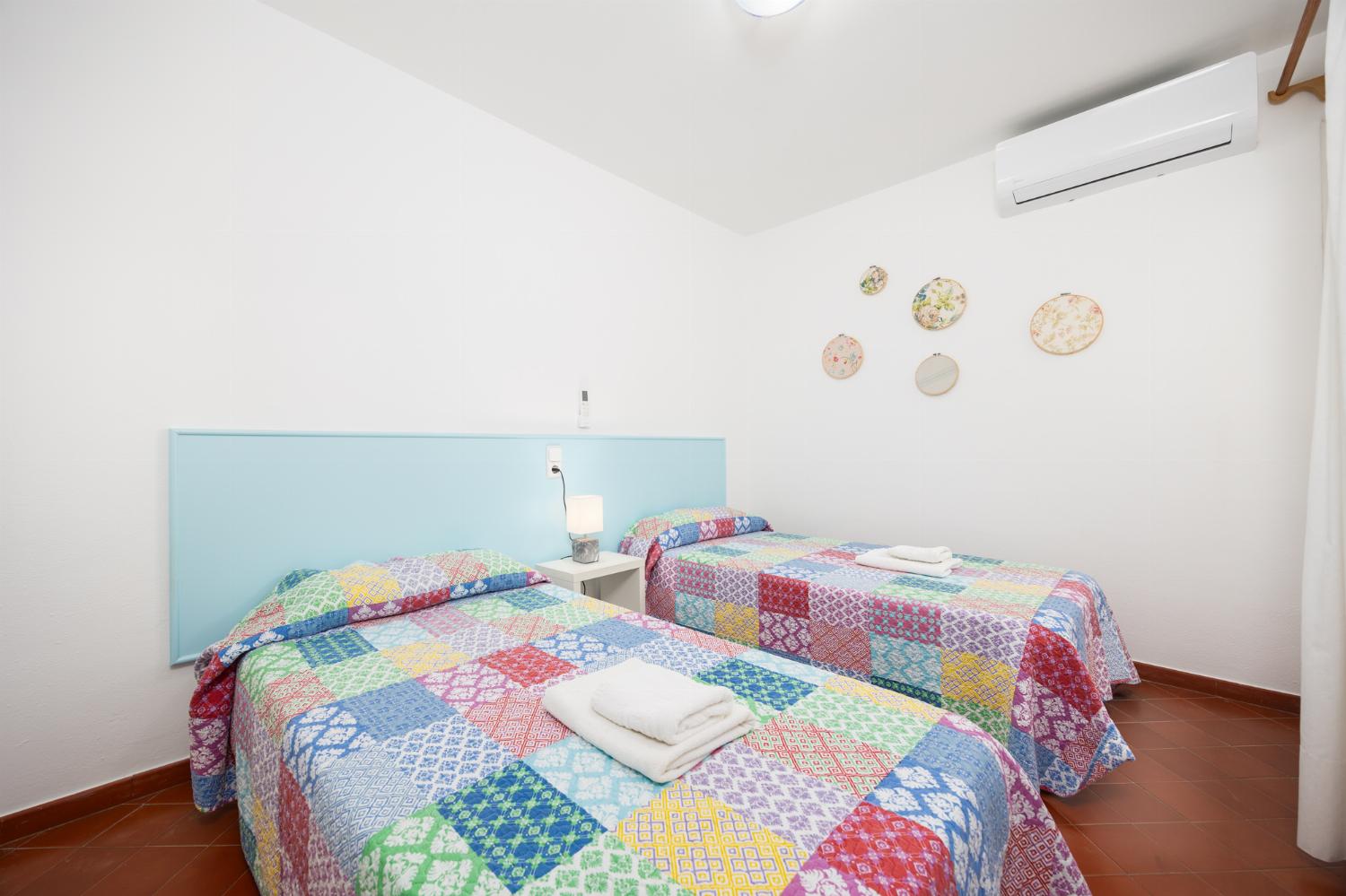 Twin bedroom with A/C