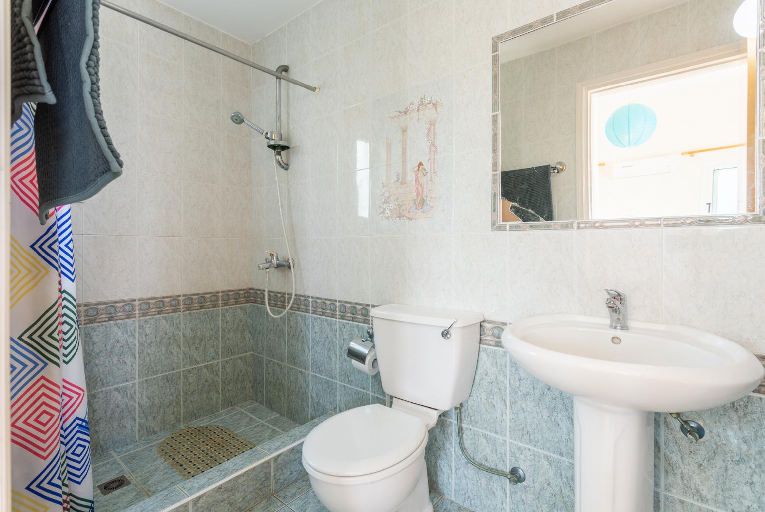 En suite bathroom with shower