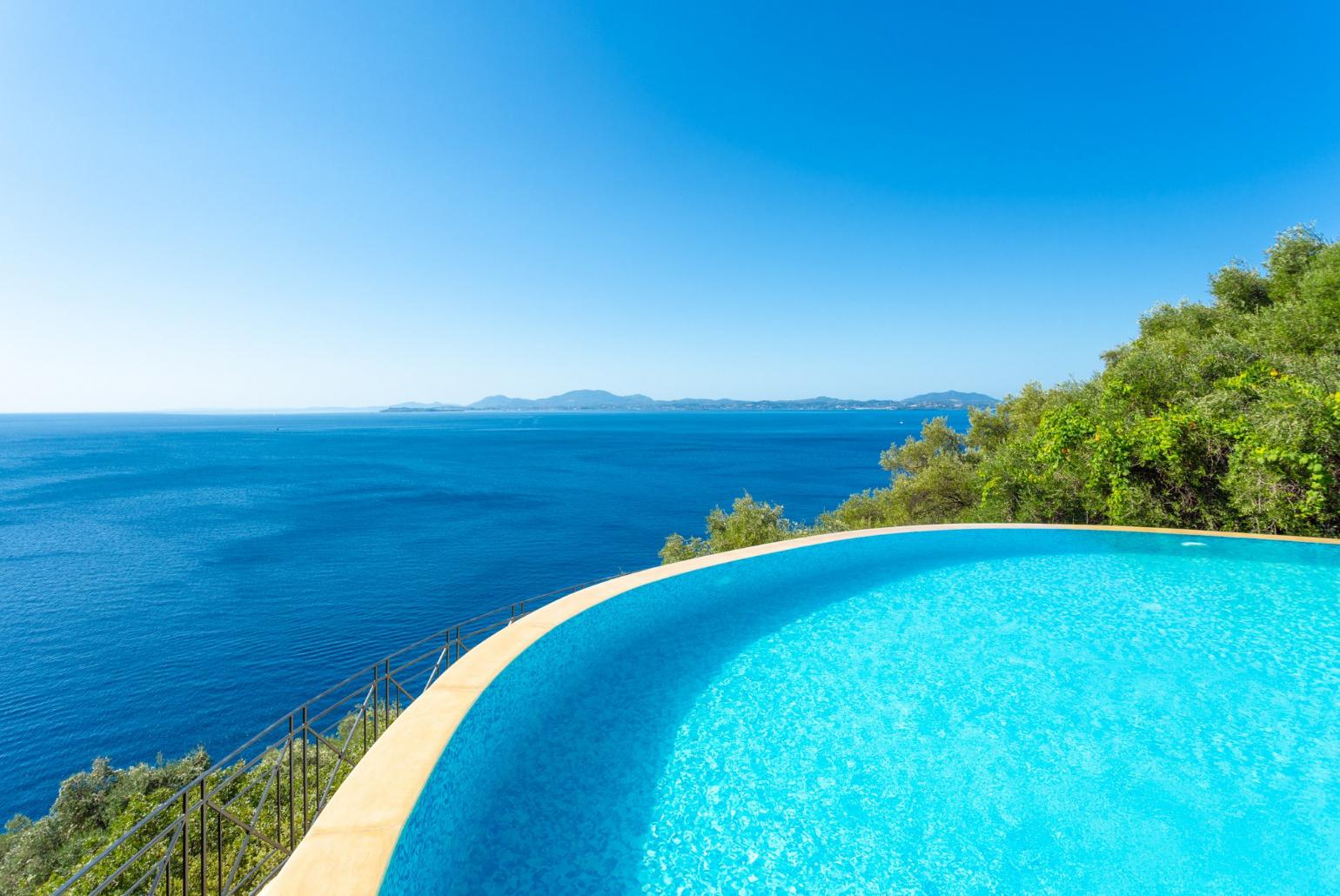 Private infinity pool and terrace with panoramic sea views
