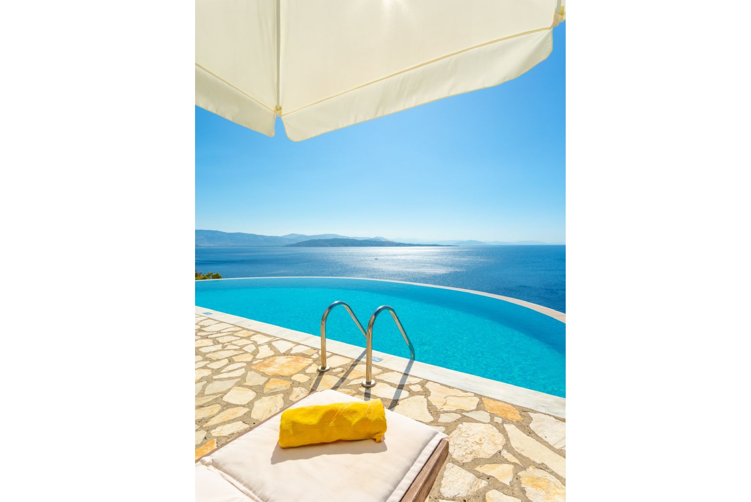 Private infinity pool and terrace with panoramic sea views