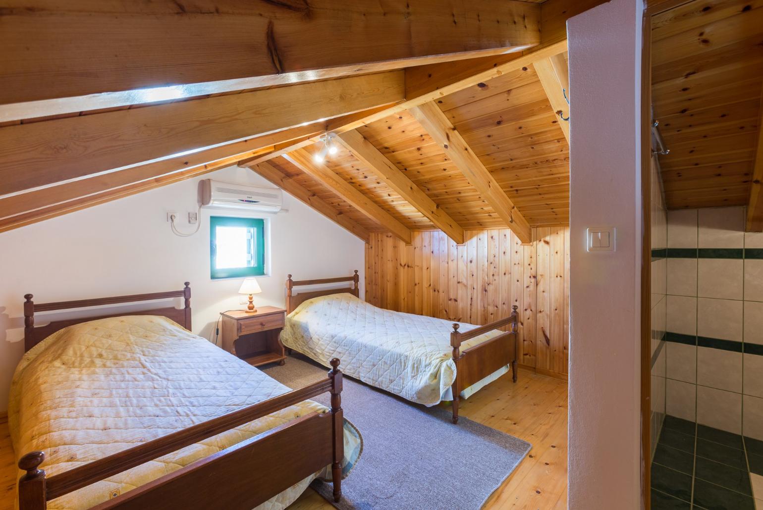 Twin bedroom in loft with en suite W/C