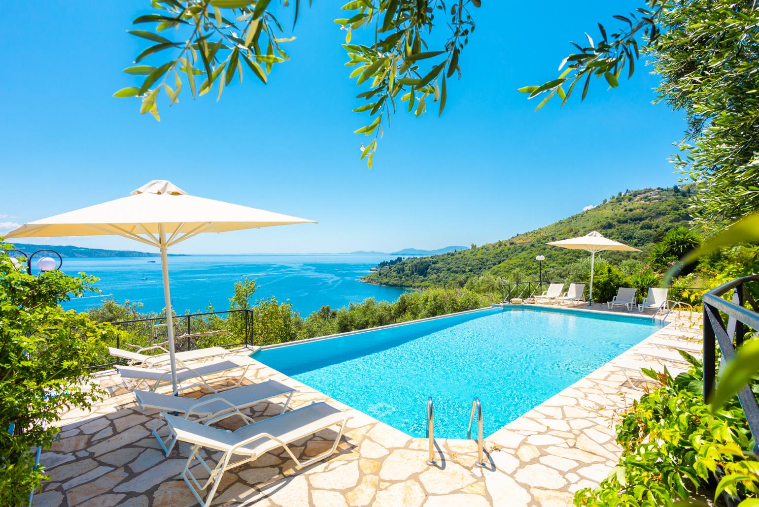 Private infinity pool, terraces, and gardens with panoramic sea views