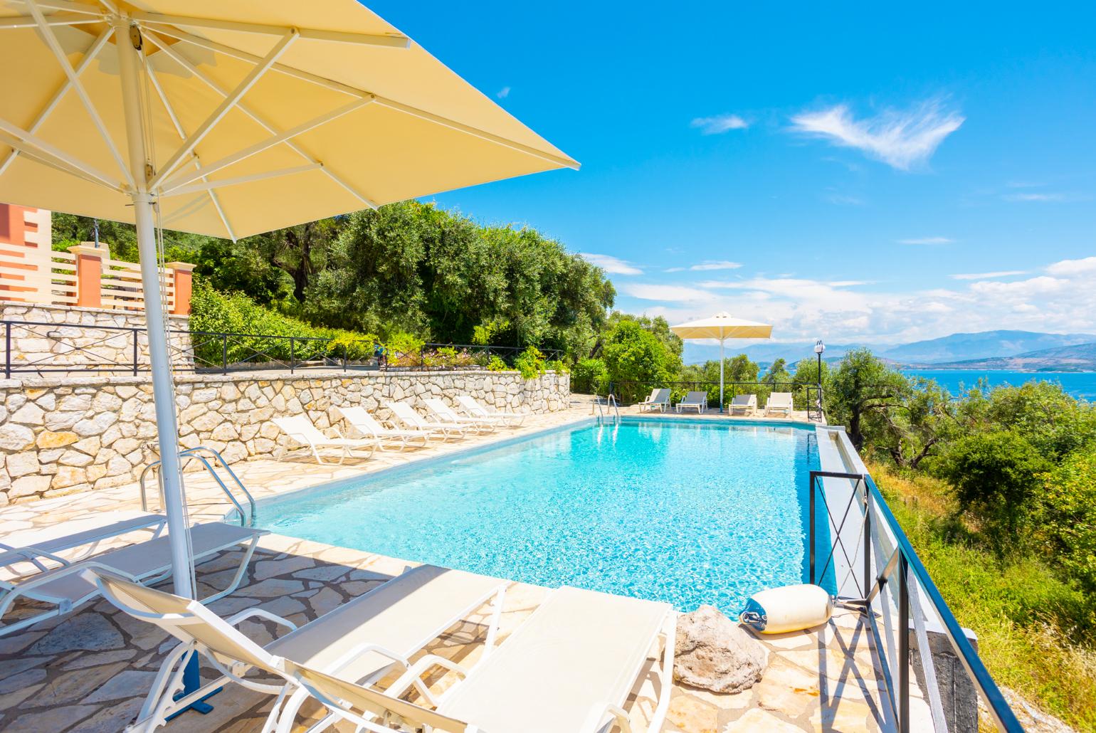 Private infinity pool, terraces, and gardens with panoramic sea views