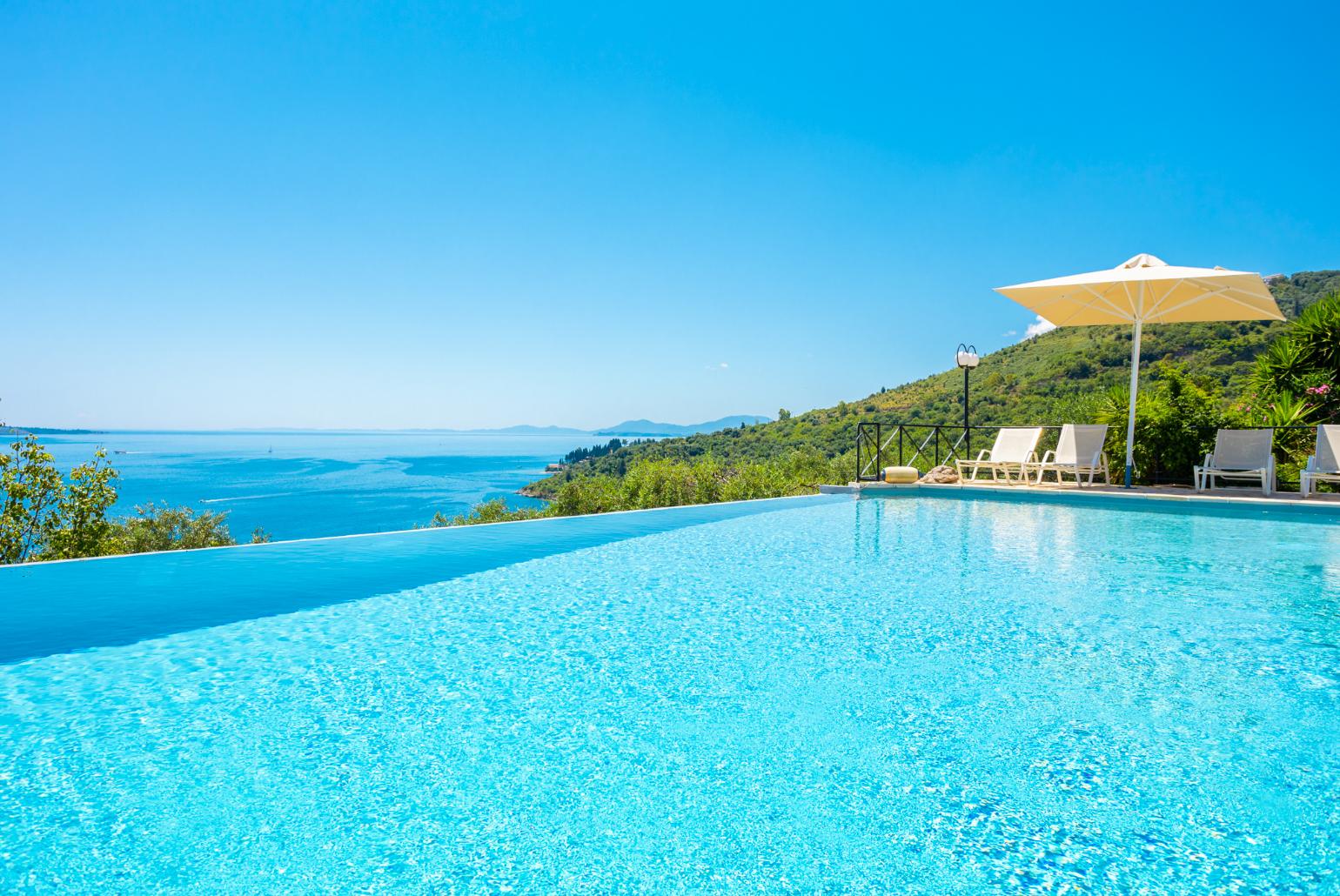 Private infinity pool, terraces, and gardens with panoramic sea views
