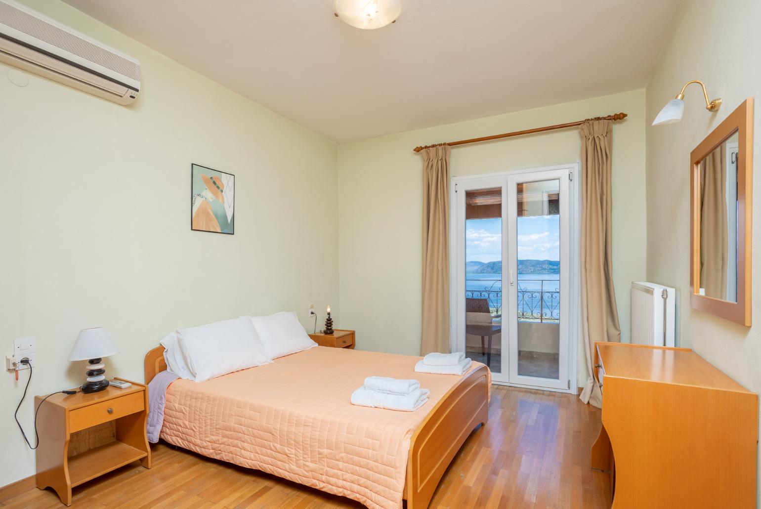 Double bedroom with A/C and balcony access with panoramic sea views