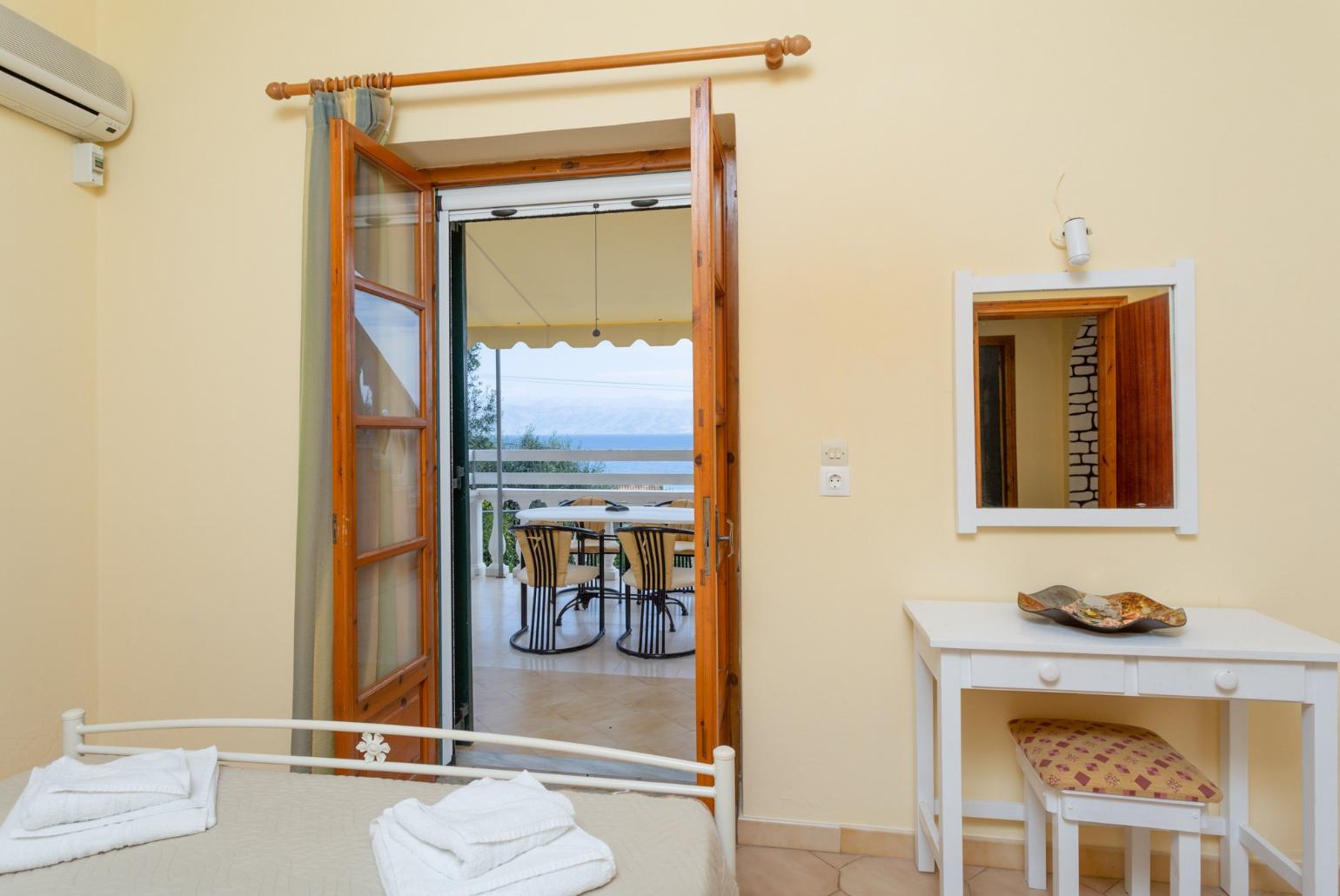 Double bedroom with A/C and terrace access with sea views