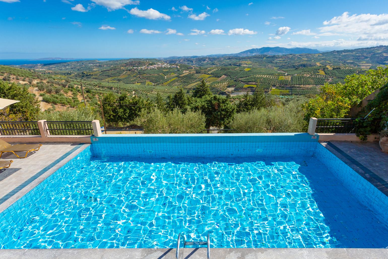 Private infinity pool and terrace with panoramic sea and countryside views