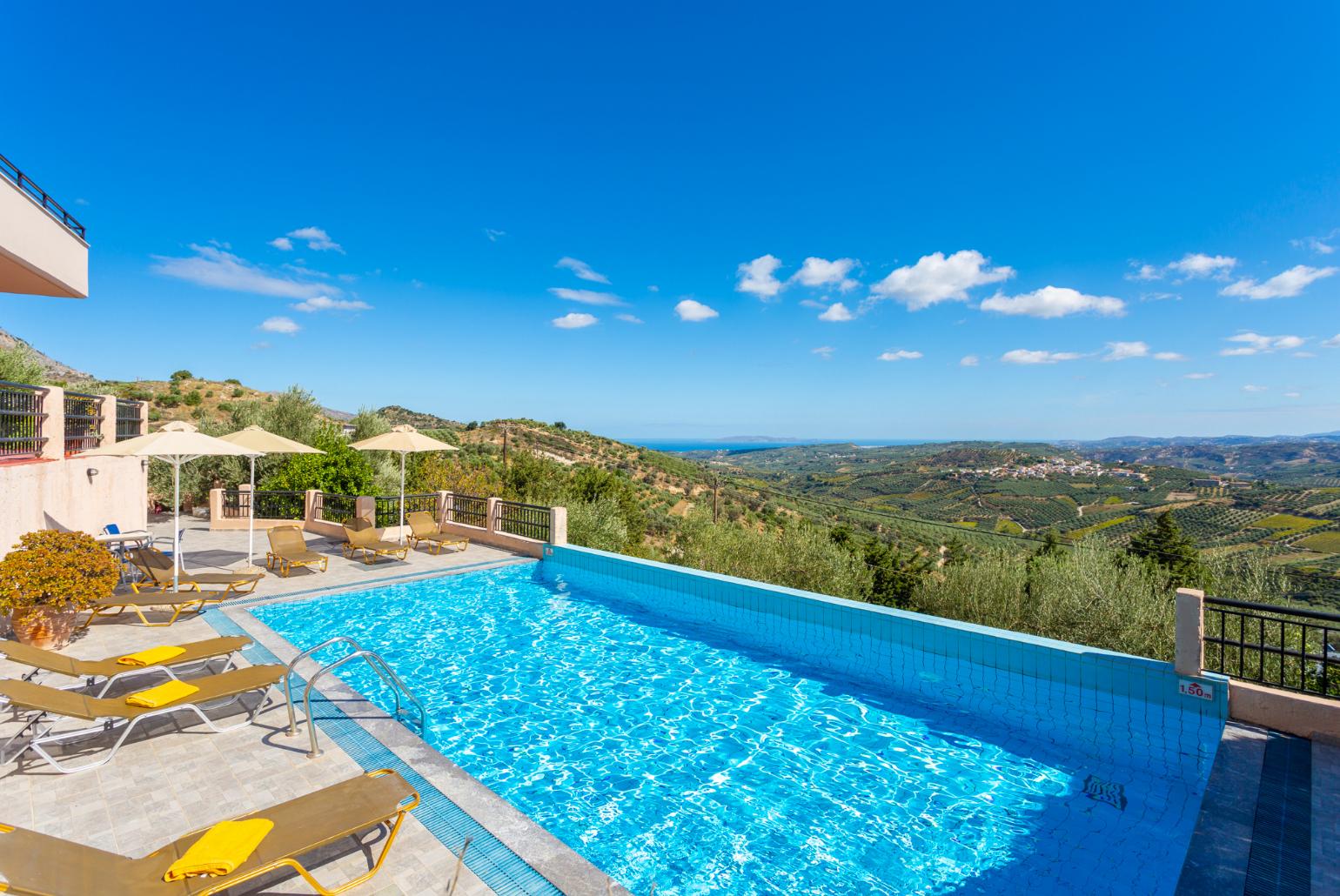 Private infinity pool and terrace with panoramic sea and countryside views