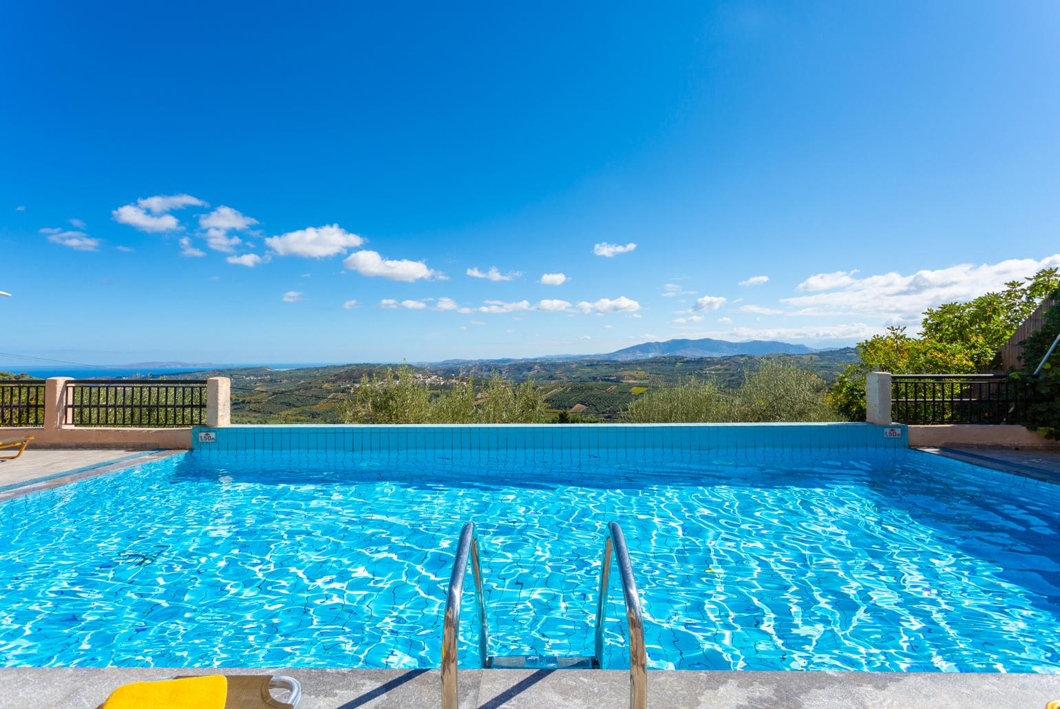 Private infinity pool and terrace with panoramic sea and countryside views