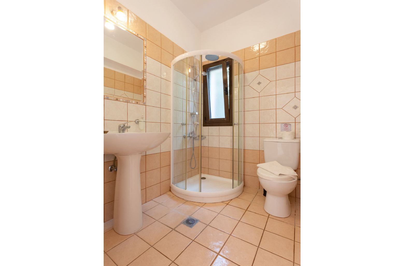 Family bathroom with overhead shower