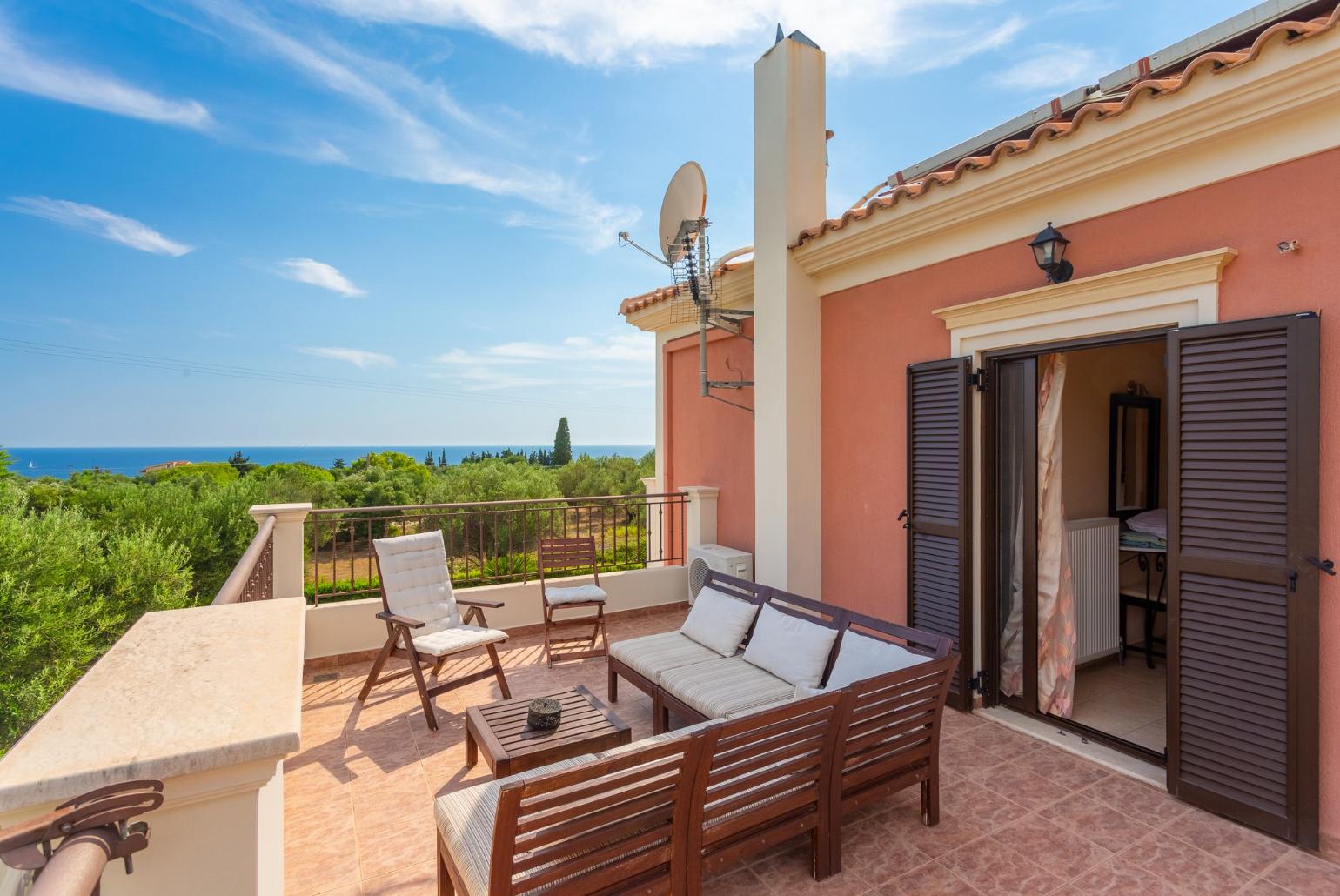 Balcony with outdoor seating and sea views