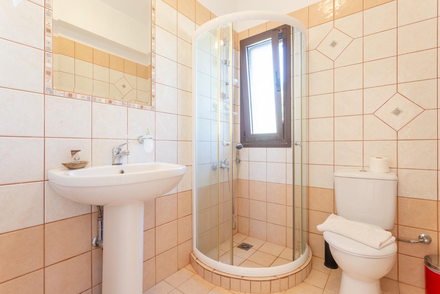 Family bathroom with overhead shower