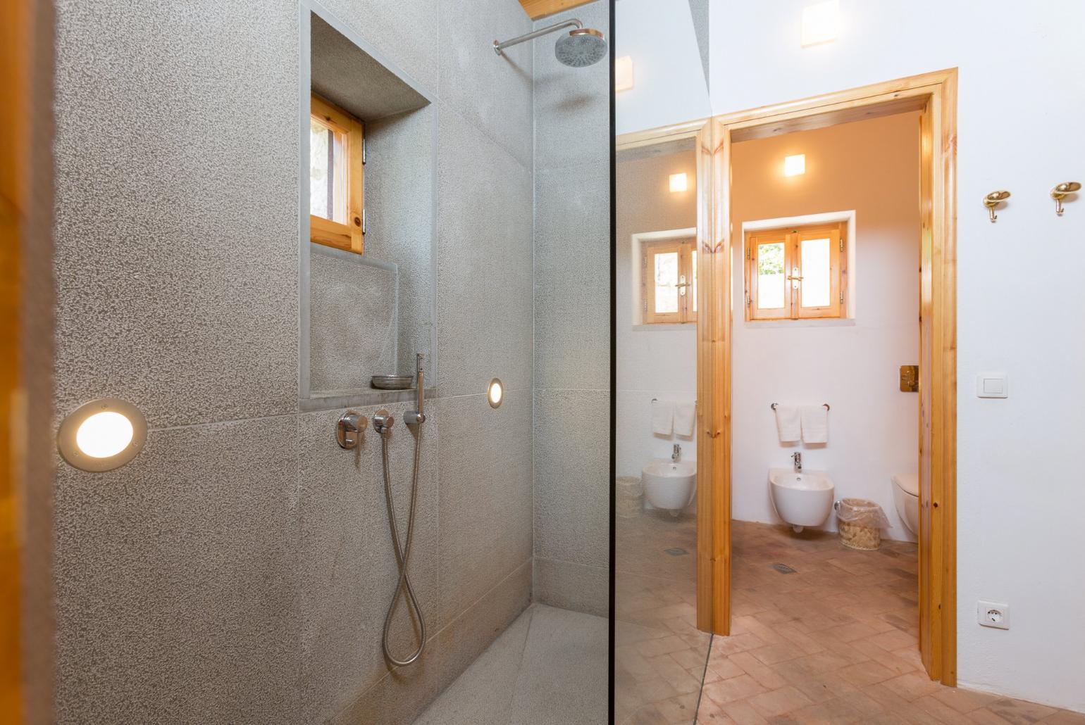 Family bathroom with overhead shower