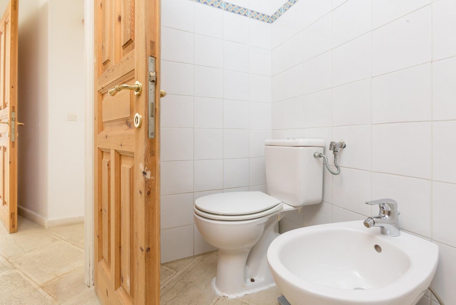 Family bathroom with overhead shower