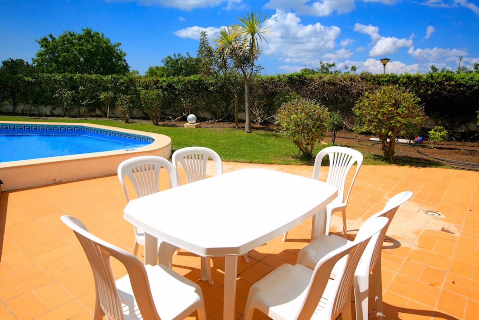 Private pool with terrace and garden area