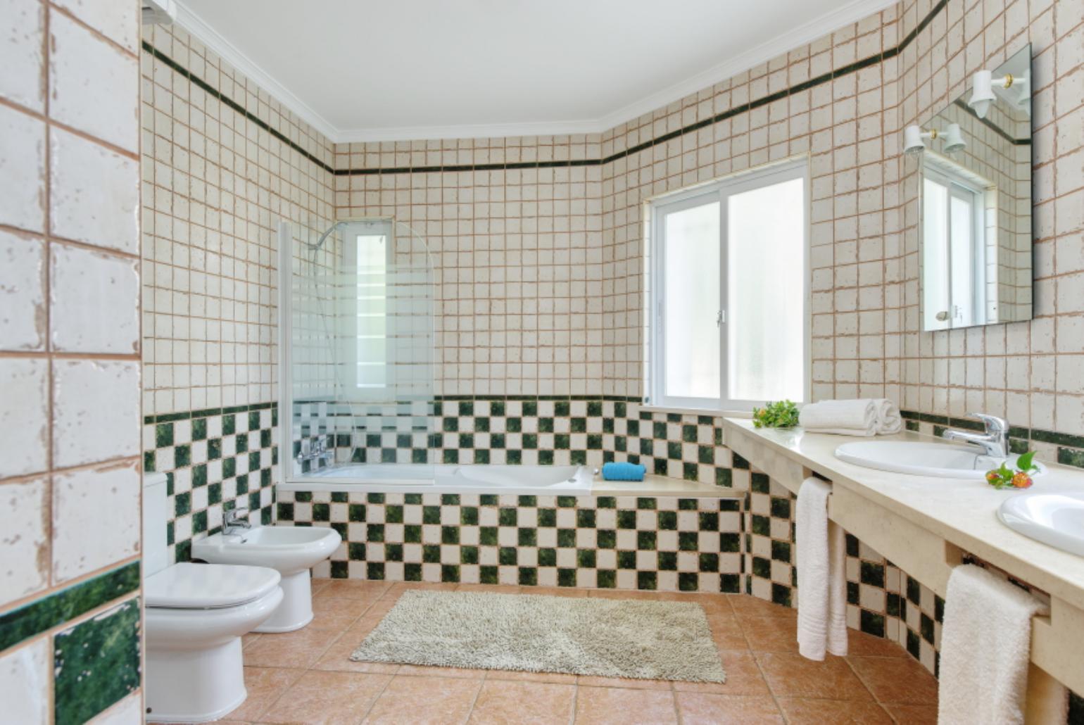 Bathroom with bath and overhead shower