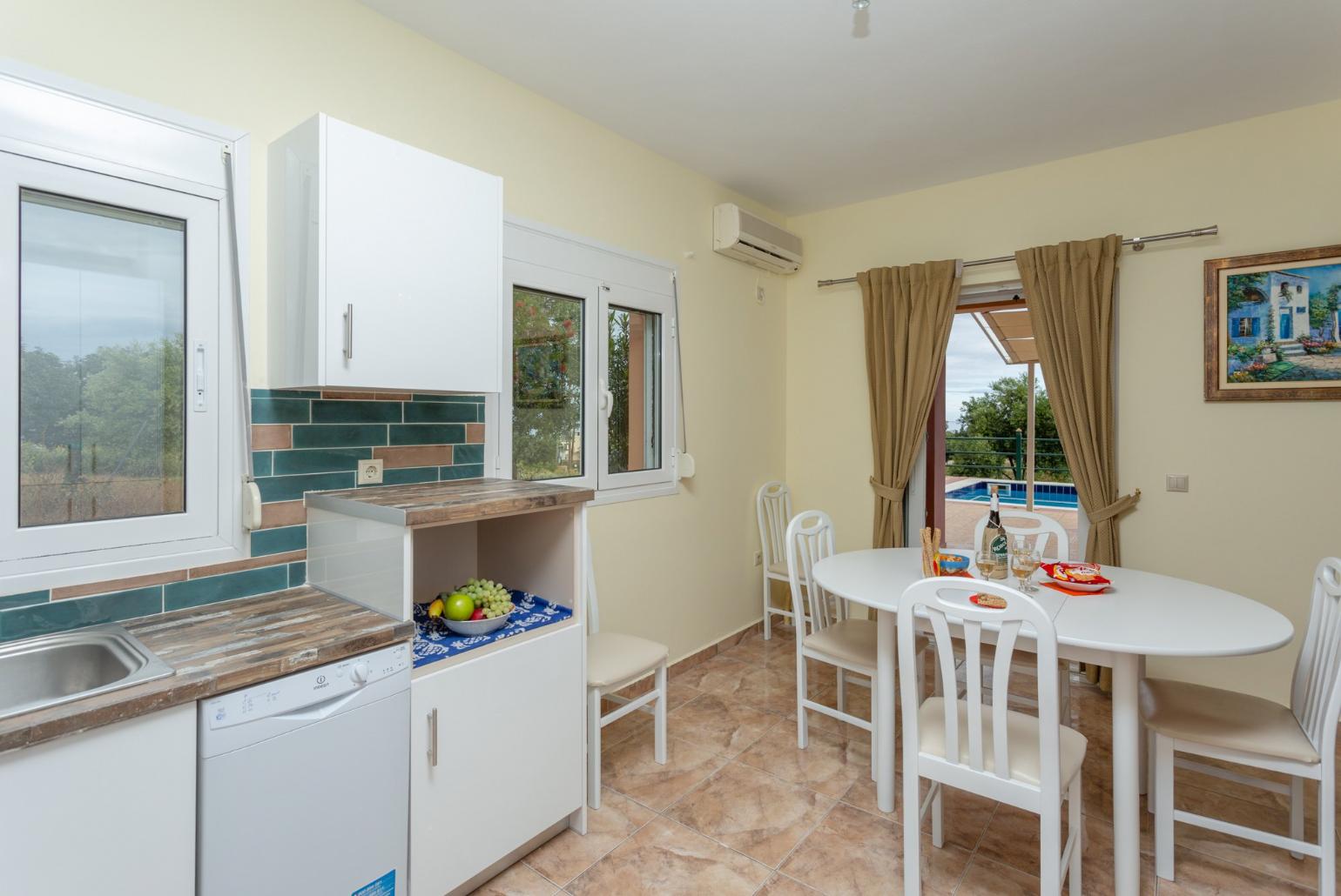Equipped kitchen and dining area