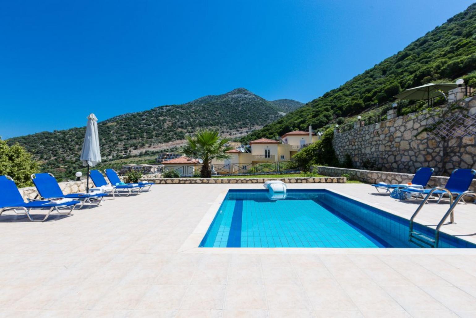 Private pool with terrace and garden area