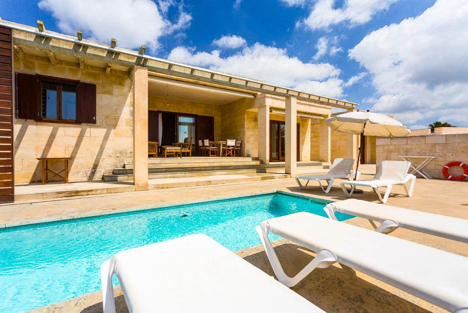Beautiful villa with private pool, partially sheltered terrace, and sea views