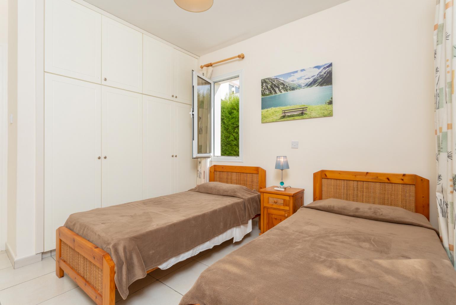 Twin bedroom with A/C and pool terrace access