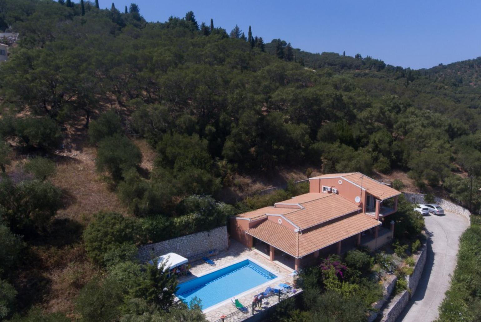 Overview of the villa and entrance road