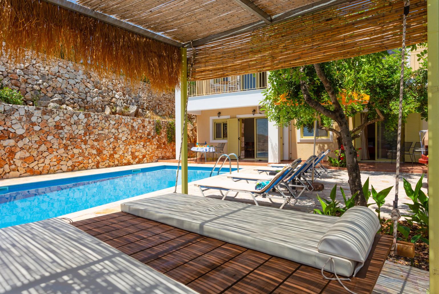 Sunbeds with pergola 