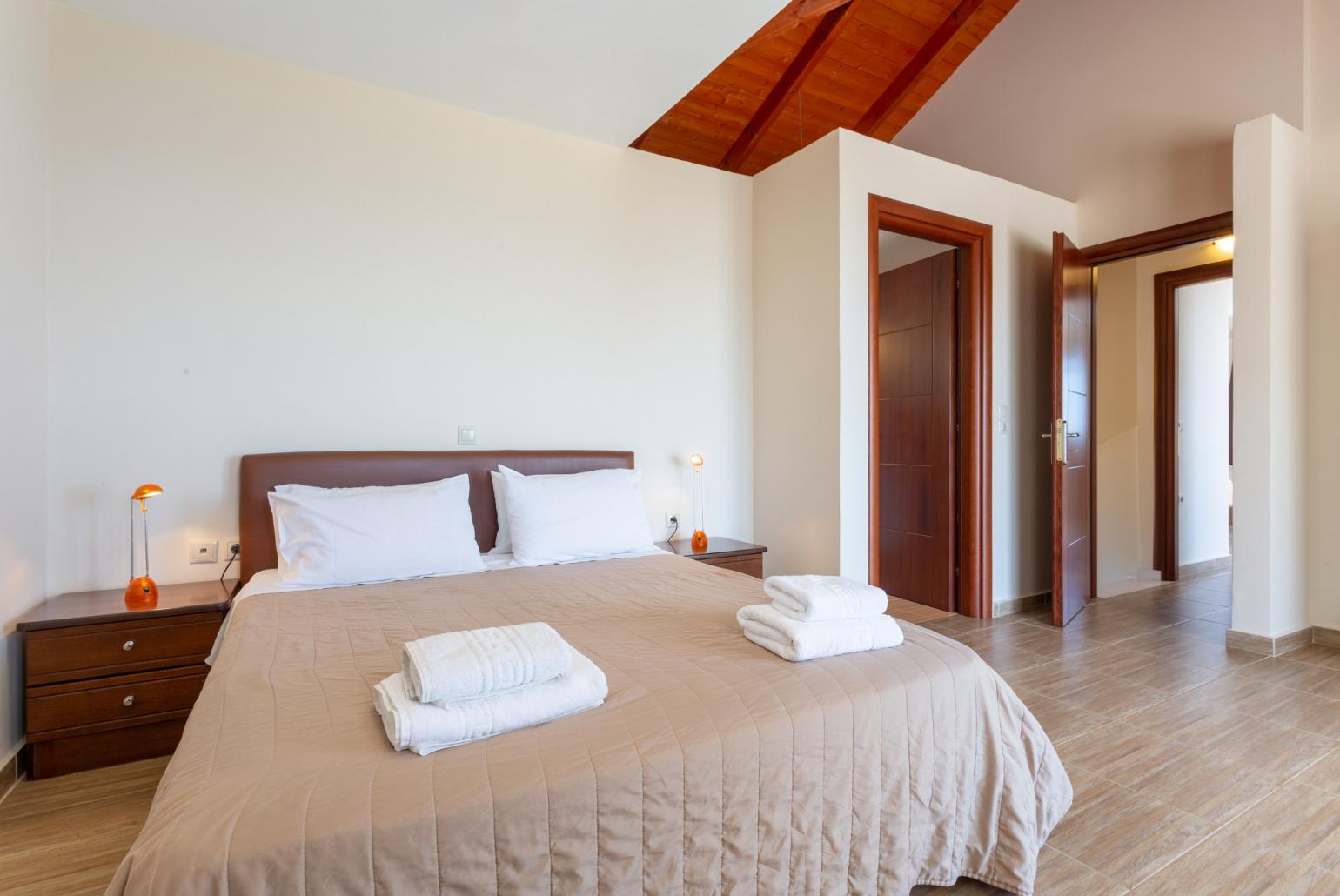 Double bedroom with en suite bathroom and balcony access