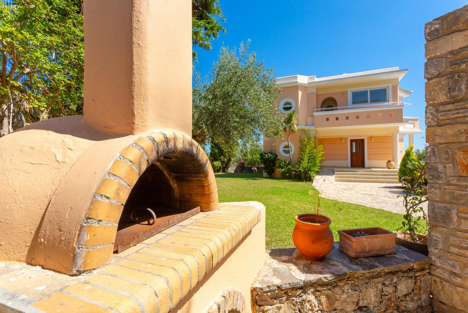 Terrace area with BBQ and wood fired oven