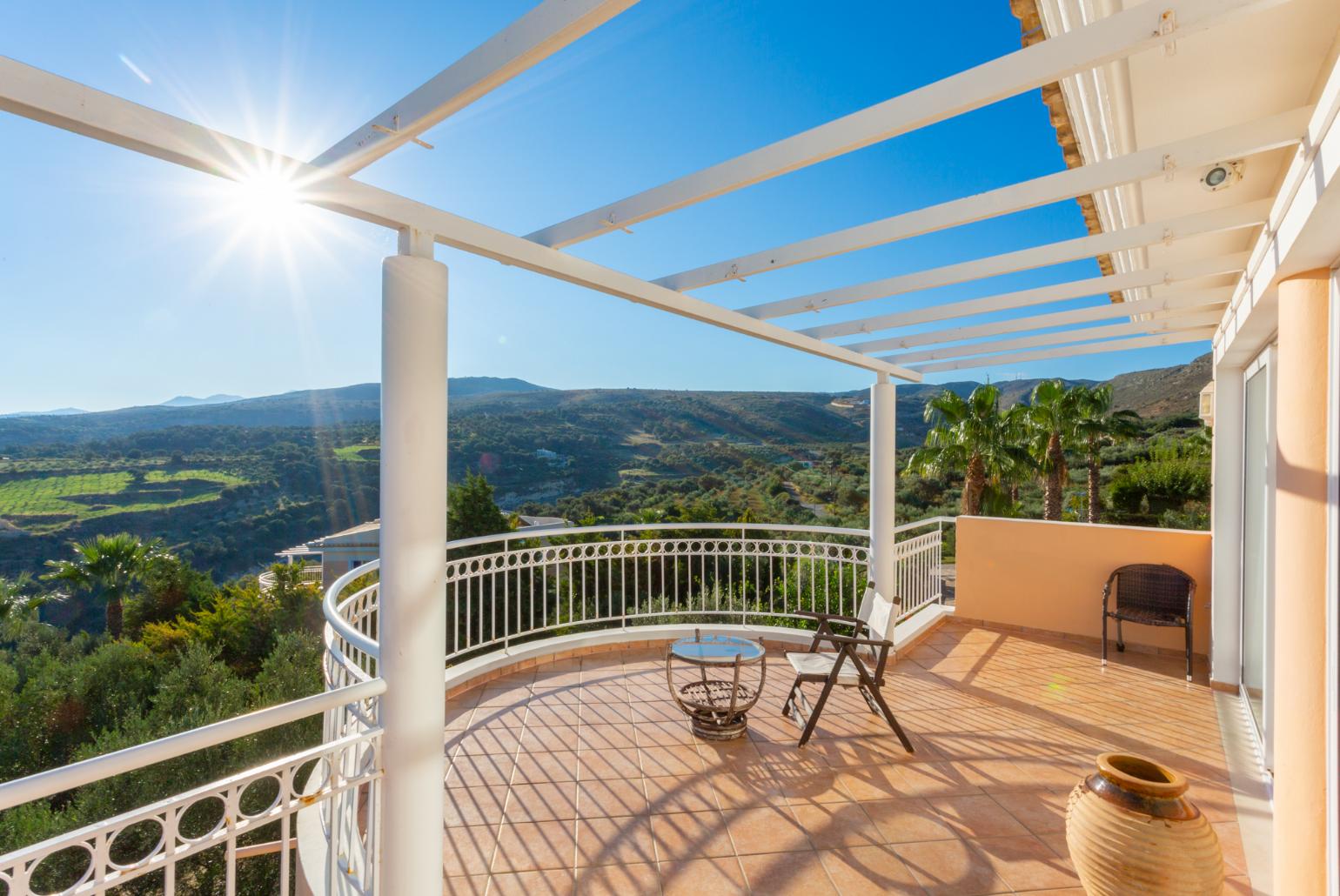 Balcony with countryside and sea views